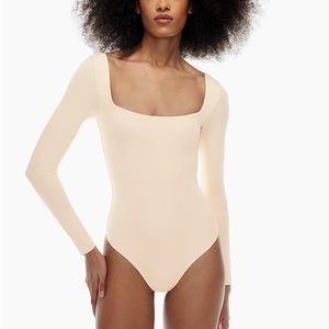 babaton contour square neck long sleeve bodysuit in denude